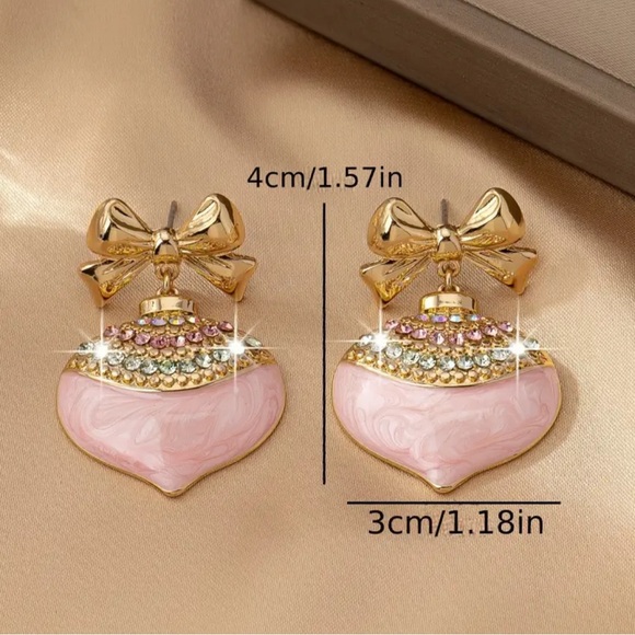 "Sweetheart Sparkle: Golden Bow & Pink
Heart Earrings" - Picture 5 of 5